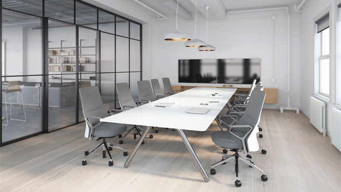 Long modern conference table surrounded by grey office chairs set in meeting room with glass doors