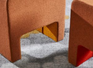 Detail of orange office furniture upholstery and stitching