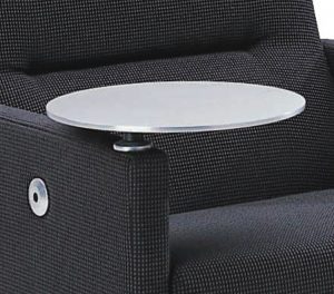 tablet table attached to the arm of a black upholstered arm chair