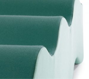 Light green wave-shaped bench with fabric upholstery