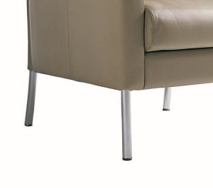 Aluminum legs underneath beige leather sofa