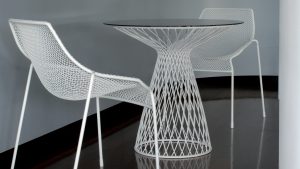 Metal wire outdoor table and matching wire outdoor chairs, finished in white