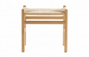 Low wooden stool with wicker seat