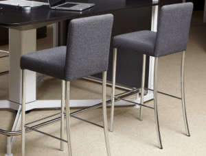 Office stools with grey upholstery and cushioned back placed near wooden meeting table