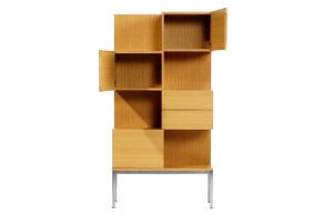 Tall wooden storage cabinet with open storage panels