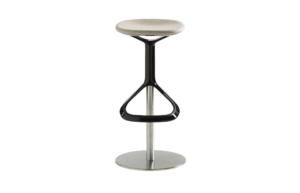 Lox office stool with beige upholstered seat, black metal footrest, and brushed metal post