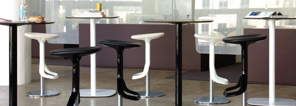 Office cafe with matching black and white stools & cafe-height tables
