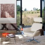 white bob lounge seating in a cozy room full with accessories and a small table in front