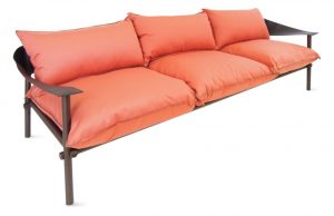 Orange sofa cushions on metal sofa base
