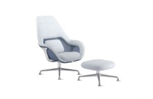 High-backed light grey office lounge chair with matching ottoman