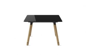 Office table with black glass top and wood legs