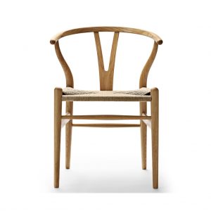 Wooden Wishbone guest chair with wicker fabric seat and wood frame
