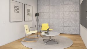 Lounge space in office with two office rocking chairs, soundproof wall, and chalkboard for note-taking