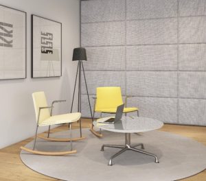 Lounge space in office with two yellow office rocking chairs and soundproof wall