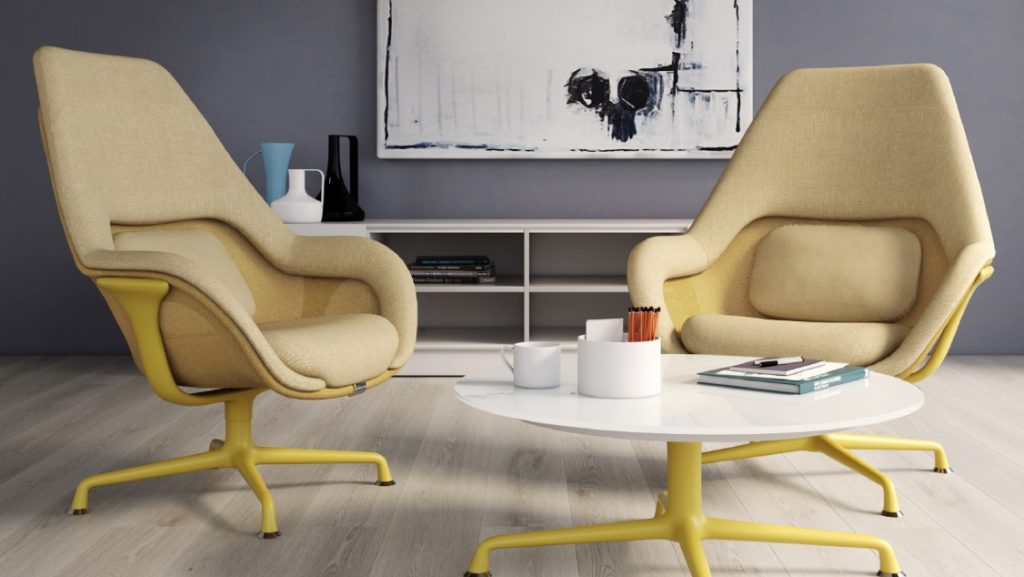 Matching yellow armchairs with round coffee table and white storage cabinet