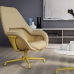 Yellow SW_1 lounge chair with yellow painted legs next to SW_1 coffee table with matching yellow legs