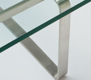 Aluminum base connected to thick glass coffee table top