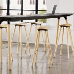 high table with 5 Enea Cafe Wood Stools around