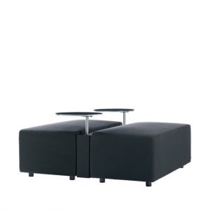 Await office lounge system with two black upholstered ottomans connected by slim console table with tablet tables attached