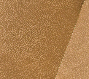 Closeup detail of tan leather upholstery pattern and stitching