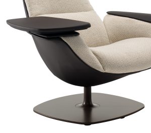 Built-in side table attached to armrest of plush, high-backed office lounge chair