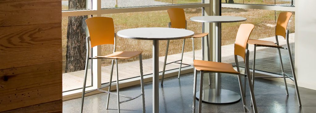 Mixed material office cafe furniture with cafe-height tables and cafe chairs with yellow back and seats