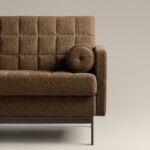 half of a Millbrae contract sofa in brown