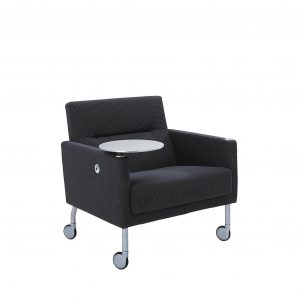 Mobile office lounge chair with attached side table and casters, upholstered in patterned black fabric