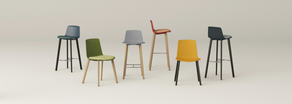 Grouping of office chairs and stools of various heights and colors