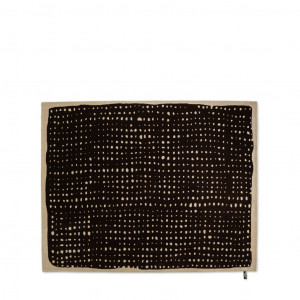 Nanimarquina basket rug with contrasting black and tan fabric pattern