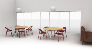 Modern dining area with round wood tables, red chairs, and large windows