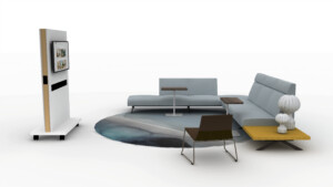 Modern lounge setup with sectional seating, side tables, digital display kiosk, and accent furniture