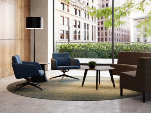 Modern lounge area with blue chairs, upholstered seating, round table, and floor lamp near large windows