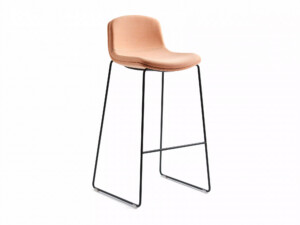 Armless stool with black legs on a neutral background.