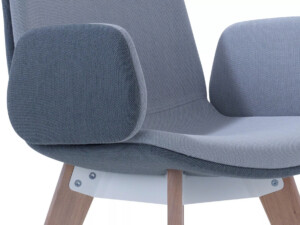 Close-up of blue chair with wooden legs.