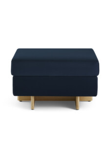 Galesburg footstool in dark blue on white background.