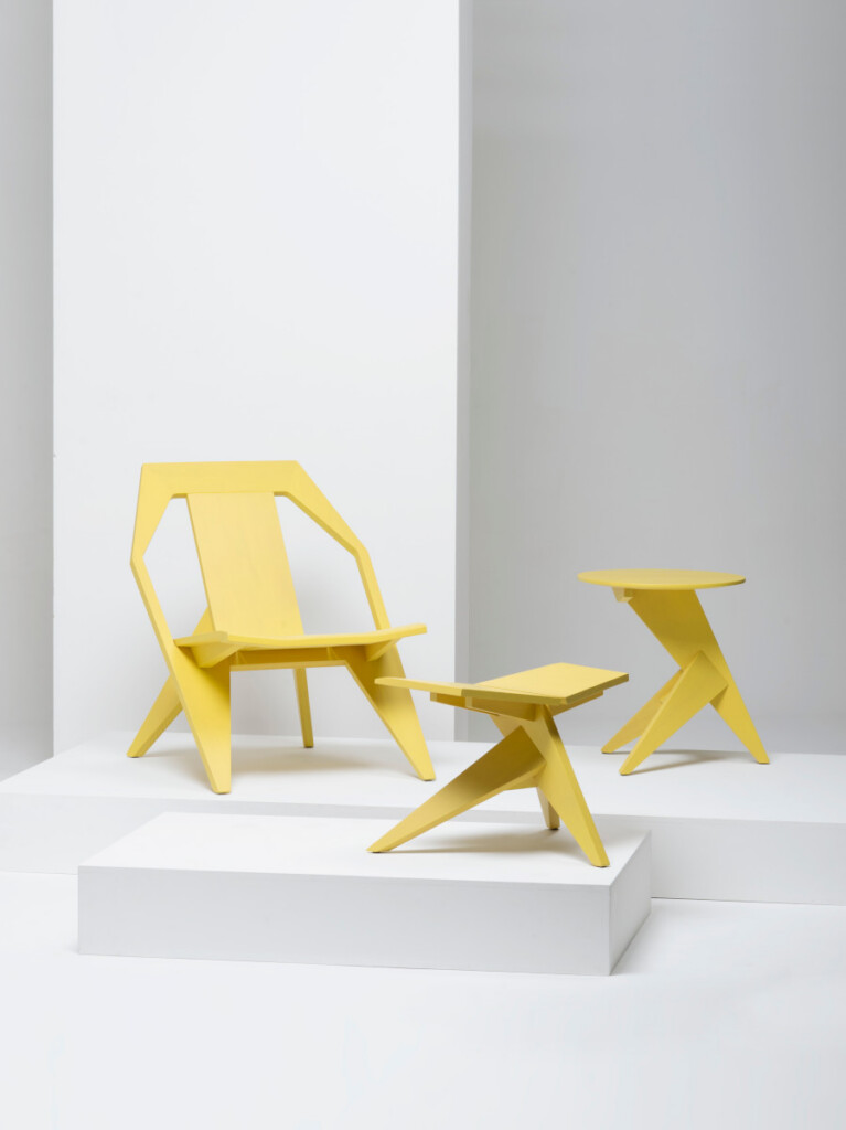 Yellow Seating chair, stool and table set on a white background