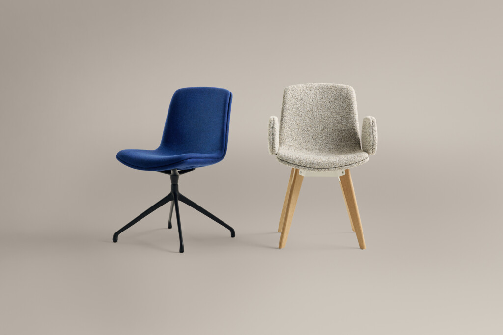 Blue and beige upholstered chairs against neutral background