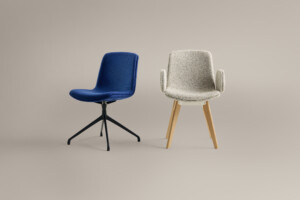 Blue and beige upholstered chairs against neutral background