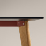 Close-up of table with wood legs