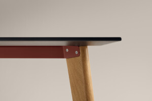 Close-up of table with wood legs
