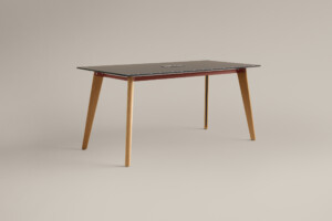 Wood table with integrated power outlet on neutral background