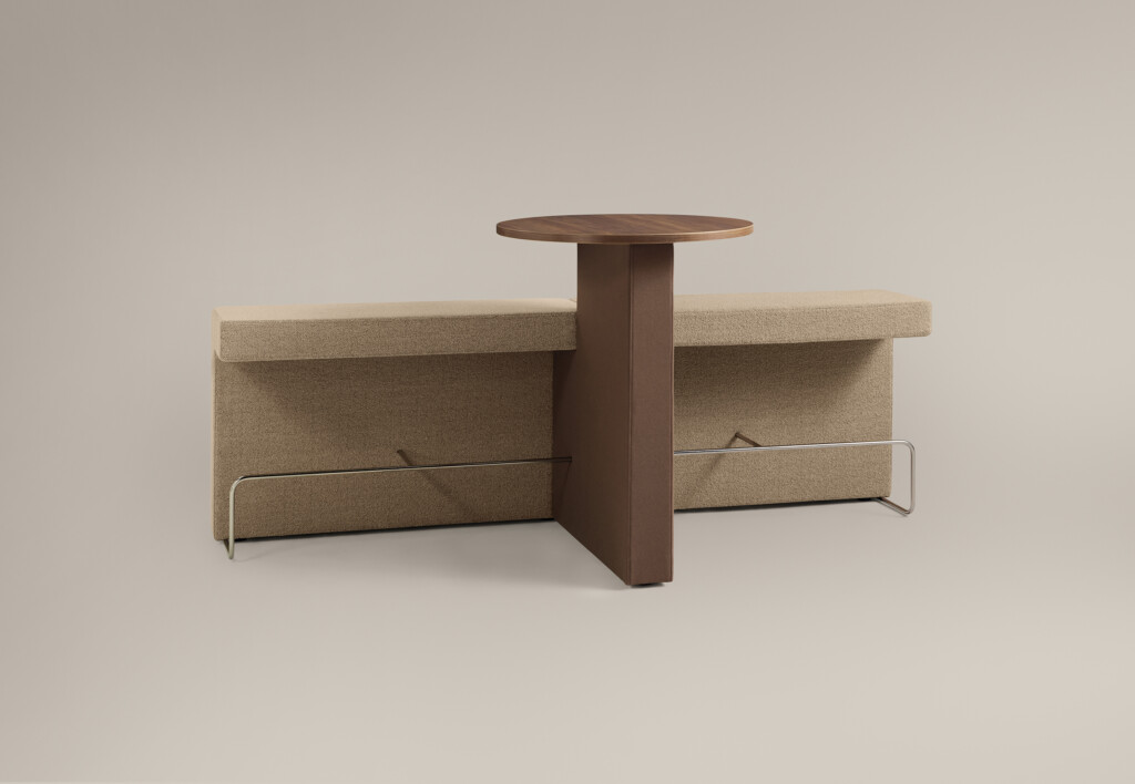 modern upholstered bench and integrated wood table against neutral background
