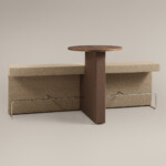 modern upholstered bench and integrated wood table against neutral background