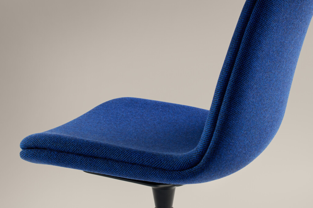 Close-up of blue upholstered chair
