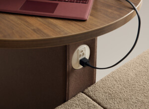 Wood table with integrated power outlet