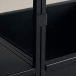 Close-up of black shelving unit