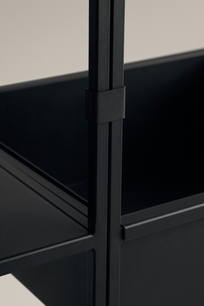 Close-up of black shelving unit