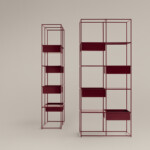 Red shelving units on neutral background