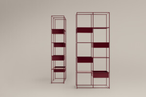 Red shelving units on neutral background